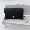 Keychains lanyards unisex designer nyckelpåse mode läder handväska nyckelar mini plånböcker