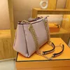 Bolsas de moda Bella Mahina perfurou uma bolsa de luxo de luxo de luxo letra de letra de flor Padrão de flores de couro crossbody saco saco oco para fora bolsas de corrente