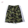 Maillots de bain pour hommes Maillots de bain pour hommes Maillots de bain pour hommes Pantalons courts de plage camouflage pour hommes et femmes Mode imprimé été Séchage rapide Hip-hop Casual Cottnon