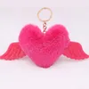 Coeur ailes amour boule de cheveux porte-clés pendentif sac en peluche fille ornements voiture pendentif Llaveros Mujer Pom Pom porte-clés accessoires