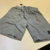 Praia 2023 Shorts de verão Mens Calças Curtas Moda Correndo Solto Processo de Lavagem Seca Rápida de Tecido Puro Trendy Casual Hip-hop Ins Pedras 1132ESS