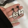 Orecchini a bottone in stile coreano, femminili carini, accessori per gioielli da festa in resina bianca e nera a forma di cuore