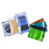 Vente en gros 100pcs emballage translucide et couleur sac d'emballage à fermeture à glissière avec trou de suspension en plastique mylar clair sur les sacs de poche de couleur avant de différentes tailles