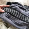 Pantaloni da uomo Uomo Donna 1 1 Tessuti di qualità Aghi a righe Pantaloni da pista AWGE Pantaloni Pantaloni sportivi con ricamo a farfalla grigio 230313