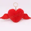 Coeur ailes amour boule de cheveux porte-clés pendentif sac en peluche fille ornements voiture pendentif Llaveros Mujer Pom Pom porte-clés accessoires