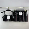 23SS FW Frauen Designer zweiteiliges Kleid Sets Strickanzüge mit gestreiftem Druck Mädchen Runway High End Luxusmarke Designer T-Shirt Weste T-Shirt Crop Tops Camisole und Minirock