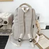 Bolsas escolares nylon impermeabilizadas mochila coreana japonesa moda estudantes bolsa escolar Multilayer Simple Sense Travel Bag 230314