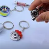 Keychains Creative gift car metal keychain tuo gear hub pendant brake disc sho absoer Pendant L230314