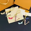 Keychains Lanyards Fashion Letter Designer Metal Womens Bag Charm Pendant Auto onderdelen Accessoires Geschenken Geschenkbeweging Current 60ess