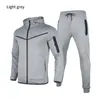 Survêtements pour hommes Printemps Automne Mode Survêtements Hommes Ensemble À Manches Longues Veste À Fermeture Éclair Pantalon De Survêtement Jogging 2 Pièces Ensembles Hommes Casual Run Sport Costume 230314