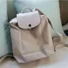 Sac à main liquidation vente en gros sacs de luxe mode femmes sacs en nylon portable femme pliable voyage étudiant sac d'école femmes sac à dos