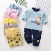 "Cute and Stylish Baby Clothing Set for Boys and Girls - Long Sleeve Trousers Suit with Dinosaur Print - Perfect Newborn Outfit!"