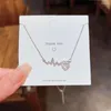 Choker Tendance De La Mode Unique Design Élégant Coeur Délicat Zircon ECG Titane Acier Clavicule Collier Femmes Haute Joaillerie Cadeaux De Fête