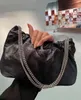 Piccola borsa a tracolla in pelle con catena Borsa da donna con pochette di design bianco nero bianco