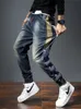 Mens Jeans Mens Jeans Harem Pants Fashion Pockets Desinger Löst fit baggy Moto Jeans Män Stretch Retro Streetwear Relaxed avsmalnande jeans 230313