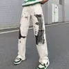 Jeans pour hommes Hommes Blanc Graffiti Impression Baggy Jeans Femme High Street Hip Hop Épissage avec Rivet Pantalon Droit Pantalon En Denim À Jambes Larges 230313