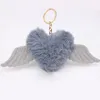 Coeur ailes amour boule de cheveux porte-clés pendentif sac en peluche fille ornements voiture pendentif Llaveros Mujer Pom Pom porte-clés accessoires