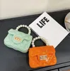 Mini sac à main pour enfants 2023 Sacs à main en PVC Jelly Bag Linger Chain Bags Enfants Pearl Baby Satchel Bag approvisionnement d'usine