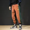 Erkekler Kot Sonbahar Kış Moda Erkekler Amerikan Tarzı Sıradan Kadife Kargo Pantolon Harem Pantolon Gevşek Uygun Fit Birleştirilmiş Hip Hop Jogger