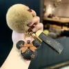 Keychains Lanyards Designer Keychain Bear Head Leather Päls Boll Pendant Key Chain Bow Car Metal Fashion Personlighet Creati Sweet No V R4GG