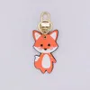 Designer Keychain Leather Pendant Fox Cartoon Car Chain Charm Brown Flower Trinka Gifts Tillbehör med Box260B