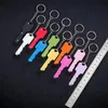 Mini Folding Knife Keychains 10 Colors Defense Key chain Key Shape Pocket Fruit Knifes Multifunctional Tool Self-defense Keychains