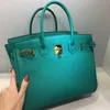 Designer Fashion Bag Lychee Grain Top Layer Cowhide Lake Water Green Bill of Lading Shoulder Messenger Tide