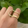 Eheringe Einzigartiges Design Goldfarbe Unregelmäßige Hohle Doppellinie Geometrische Ring Weibliche Einfache Mode Einstellbare Schmuck Großhandel