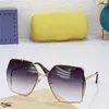 20% de réduction sur les lunettes de soleil Le nouveau grand cadre d'affichage de la famille de haute qualité fait face aux petites lunettes de soleil découpées à chevrons de Ni Ni GG0817