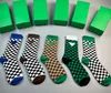 Chaussettes en forme d'échiquier vert et marron pour femmes, chaussettes tubulaires à carreaux, personnage haut de gamme, marque triangulaire, tendance