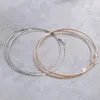 Boucles d'oreilles créoles Huggie mode transfrontalière grand cercle personnalité européenne et américaine polyvalente femme