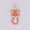 Designer Keychain Leather Pendant Fox Cartoon Car Chain Charm Brown Flower Trinka Gifts Tillbehör med Box232C