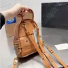 Luxurys Umhängetasche MC Damenmode-Handtaschen Top-Qualität STARK SIDE STUDS Mini-Rucksack Herren Leder Cross Body Rucksack Clutch Tote Hobo Sogar Schultaschen-Geldbörsen