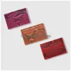 Plånböcker anpassade högkvalitativa lyxiga äkta strutsläderhållare uni smala kort plånbok fall män myntväska T221104 Drop Delivery DHTCT
