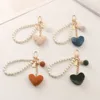 Plush Love Keychain Fashion Multi-colored Decorative DIY Bag Decoration Pendant Pearl Keychain Earphone Sleeve Pendant