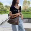 2023 Fashion M45522 Embossed braided wrist Metal engraved pull Chain Lady High Quality grained Leather hobo bag shoulder bags handbag showecomfort01