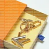 2023 Fashion Keychain Key Schnallen Buchstaben Ringe Design handgefertigter Liebhaber Cartoon Car Leder Ringbeutel Schlüsselanhänger Männer Frauen Bag Anhänger Top Qualität