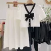 Werkjurken boog nek vrouwen rokken sets sets zomer 2023 v-neck gele shirts en a-line knielange elegante kantoordame kledingpakken