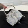 2022 Nya lyxdesigner Purses and Handbags for Women Silver Sequin Bucket Clutch Purse Tassel Evening Bag Female Shoulder Bag 230315