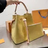 2023SS Clásico de la bolsa de asas de diseñador Bolsos de hombro de flores impresas tote diagonal de maquillaje de compras favorito de la dama