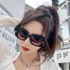 Designer heren en dames strandpaar zonnebril 20% korting op Xiaoxiangjia's mode gulle frame covers gezichtshows dunne net rood dezelfde CH6560