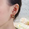 Designer Clip-On skruv Back Clover Earring Vintage Four Leaf Clover Charm Diamond Stud Earrings Rostfritt stål Studs Kvinnor Bröllopsmycken gåva