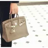 Bag 2024 Designer Fashion Layer Cow Leather Lychee Grain Leather Women's Handbag One-shoulder Cross-body Carrie