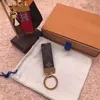 Classic Luxury Keychain Bag Charm Designer Key Chain For Men Alloy Metal Parts Letter Cowhide Leather Black Pink Cute Canvas Key Buckle Wallet Accessories PJ047 C23