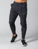 Herenbroeken Lyft Fashion Brand Street Trendy Jogging Pants Heren Zelfcultivatie Gym Fitness Training Snel drogende zwarte sportbroeken 230316