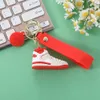 Zapatillas de deporte estéreo Llavero Niños Niñas Fiesta de cumpleaños Regalo Llavero Regalo Zapatos de lujo Llaveros Bolso de coche Llavero Zapatos de baloncesto Clave