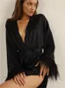 Robes décontractées Été Mince Robe Femmes 2023 Couleur Solide Plume Haute Sens Mode Sexy Glace Soie Wrap