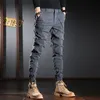 Jeans pour hommes Streetwear mode hommes jean pantalon épissé concepteur élastique coupe ajustée décontracté Cargo pantalon Hombre Hip Hop Joggers hommes salopette 230316