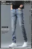 Usmens Jeans Designer, вышитые джинсы с печатными джинсами Mens Spring New Trend Slim Pants Fashion P9QS 11S2