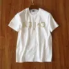 T-shirt di lusso T-shirt da uomo Camicia da donna firmata Polo estiva corta Camicia casual di moda con maglietta di marca di alta qualità